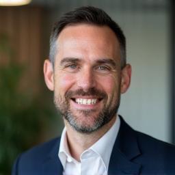 Professional headshot of Liam Kelly